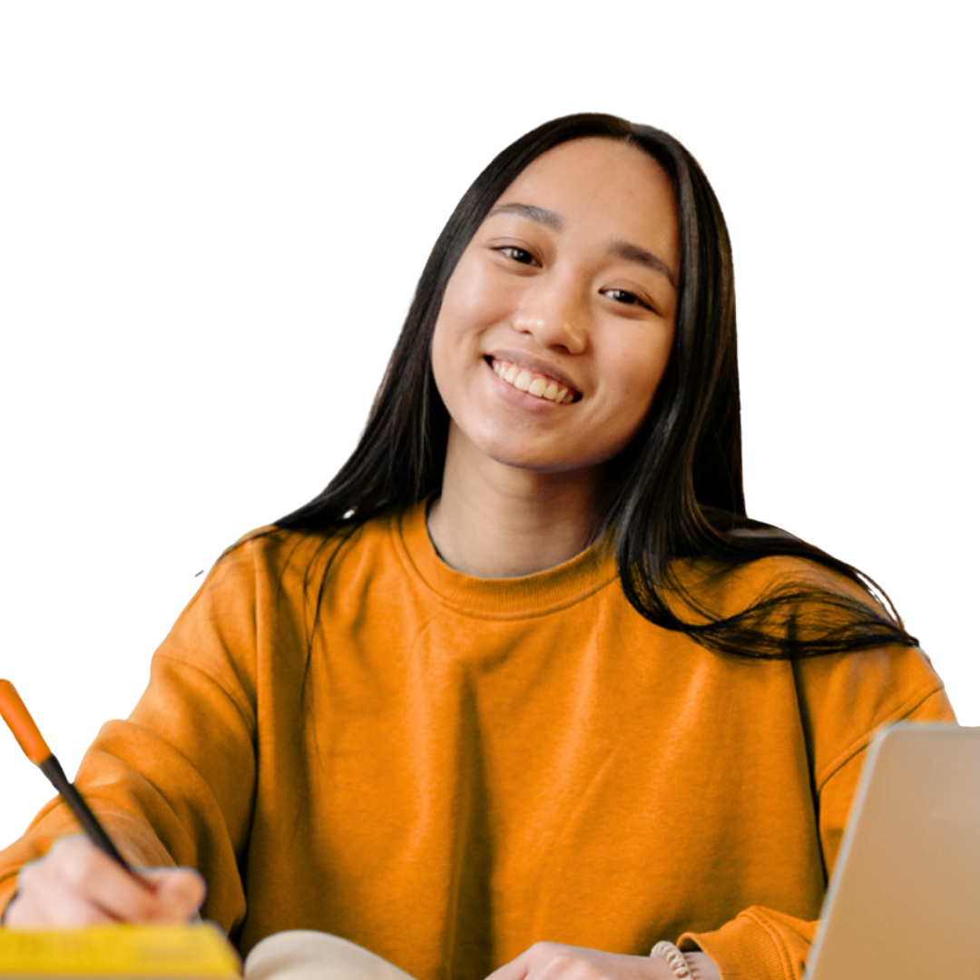 Student writing notes during a 1:1 advisor session